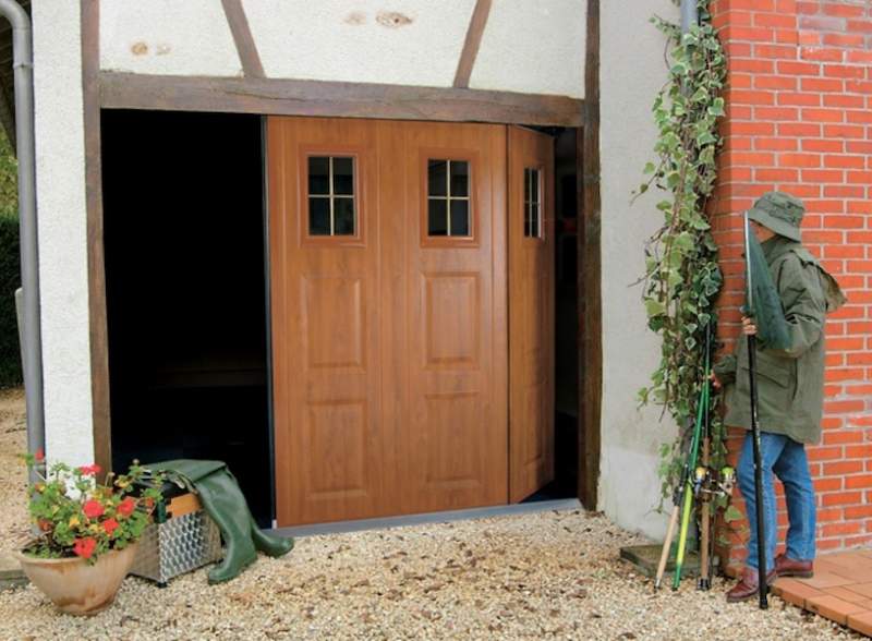 installer une porte de garage coulissante électrique sur mesure à Frouzins.